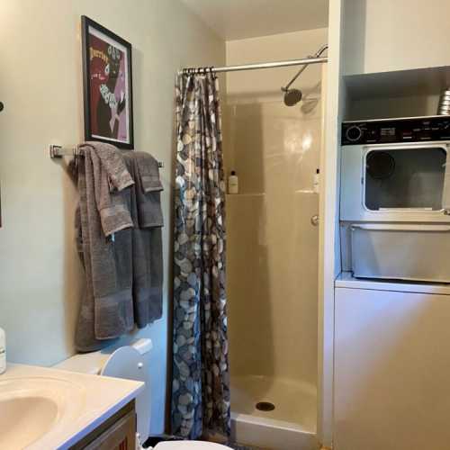 Bathroom #1: full bathroom with shower on the main floor; en suite for bedroom #1