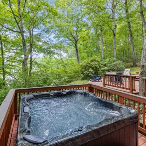 The brand new hot tub overlooks the lake!