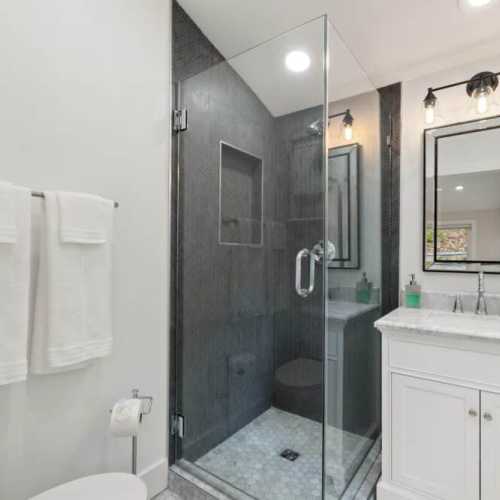 Bathroom #1: full bathroom with shower, en suite for bedroom #1