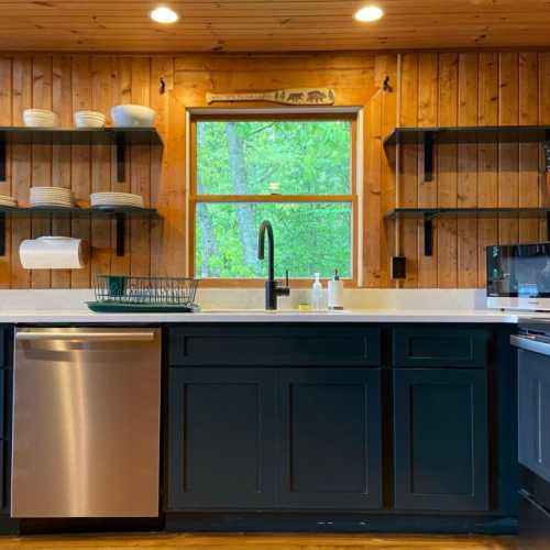 Kitchen fully renovated in May 2021! Custom cabinetry, quartz countertops, new stainless steel appliances, including a new dishwasher