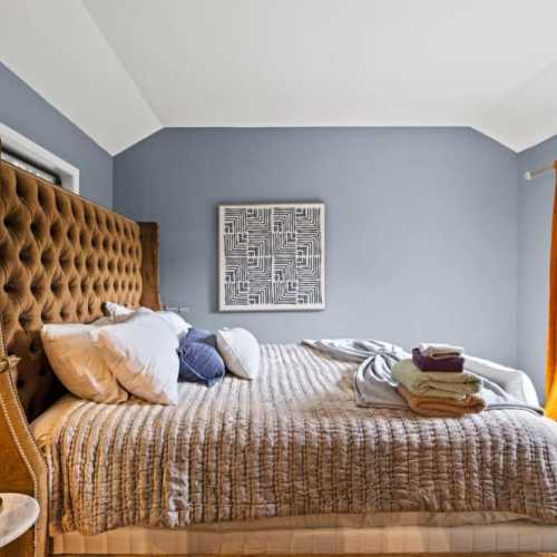 Bedroom #1: king bed on 2nd floor with a private sitting room and private balcony