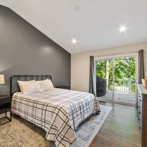 Bedroom #1: queen bed on main floor w/ en suite bath