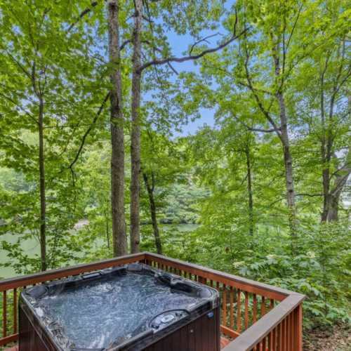 The brand new hot tub overlooks the lake!