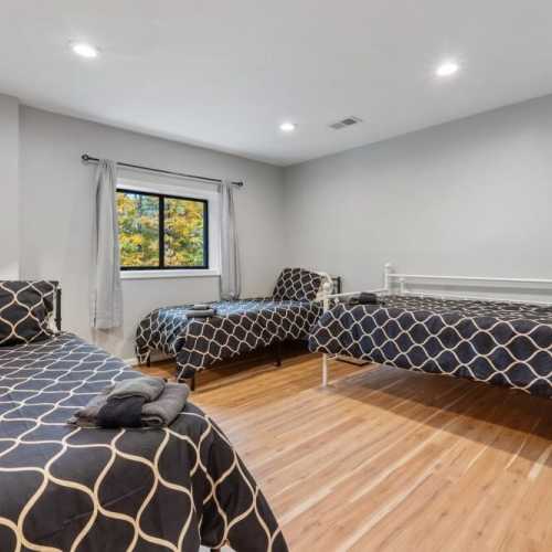 Bedroom #4: three twin beds on lower level