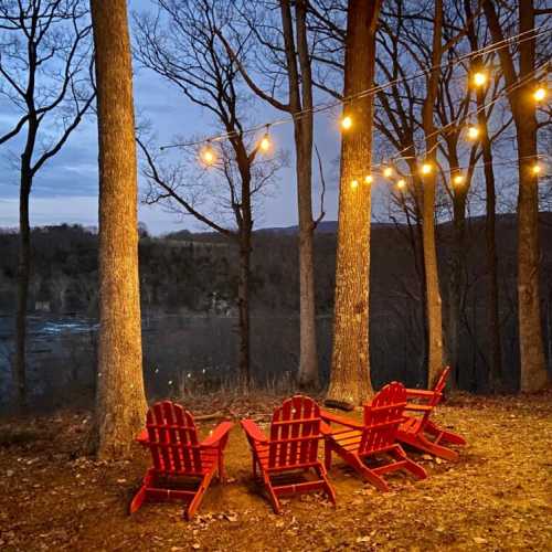 Outdoor lighting and a fire pit mean you can enjoy the view all year round and relax long after the sun sets