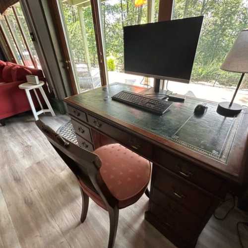 Basement living room with a projector screen