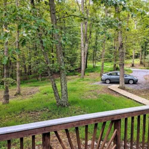 There is room for 2 cars on the gravel, and several more if parking on the grassy area on either side of the walkway