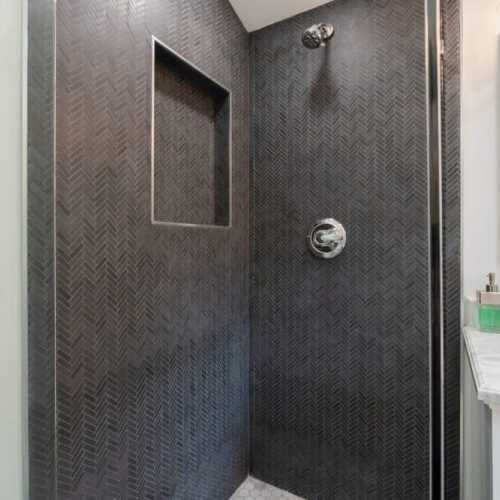 Bathroom #1: full bathroom with shower, en suite for bedroom #1