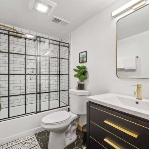 Bathroom 1: Full bath, 2nd floor. This is the only full bath in the cabin.