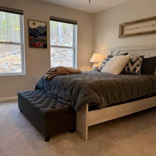 Bedroom 1: queen bed, main floor, en suite bathroom