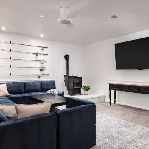 Gather in the downstairs movie room (or send the kids down there!) & log into your streaming account to pick up where you left off on Netflix!

Note: This is currently a NON-WORKING fireplace and is not listed as an amenity on this property