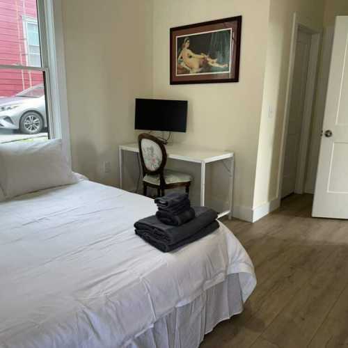 Bedroom #1: queen bed on main floor w/ en suite bathroom