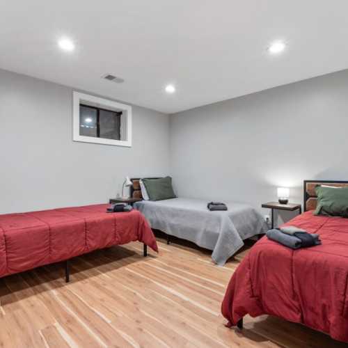 Bedroom #5: three twin beds on lower level