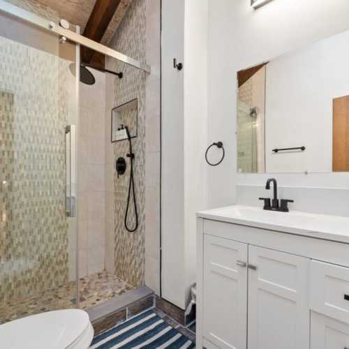 Bathroom #2: full bathroom with shower; shared by bedroom #2 and #3