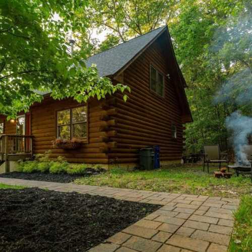 The fire pit in the back of the house means you can enjoy the great outdoors even after the sun sets and the temperature drops (firewood and hatchet not provided).