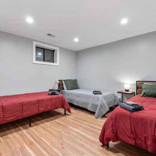 Bedroom #5: three twin beds on lower level