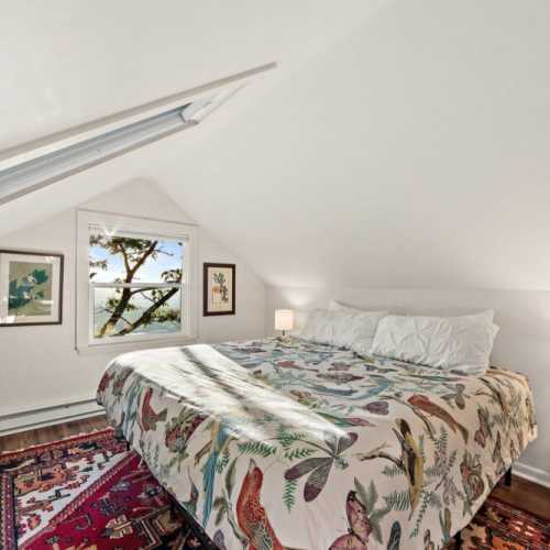 Bedroom #1: king bed on 2nd floor, with en suite half bath and extra single bed