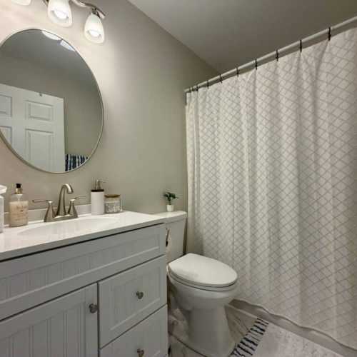 Bathroom 2: full bathroom on main floor with bathtub/shower combo