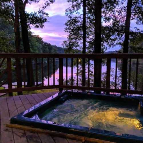 The hot tub is set into the deck overlooking the lake.  The hot tub is big enough for a maximum of 4-5 people at a time.