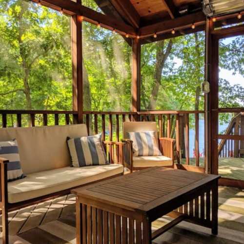 Enjoy lake views from inside the screened porch