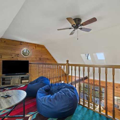 Upper floor loft overlooks the living room