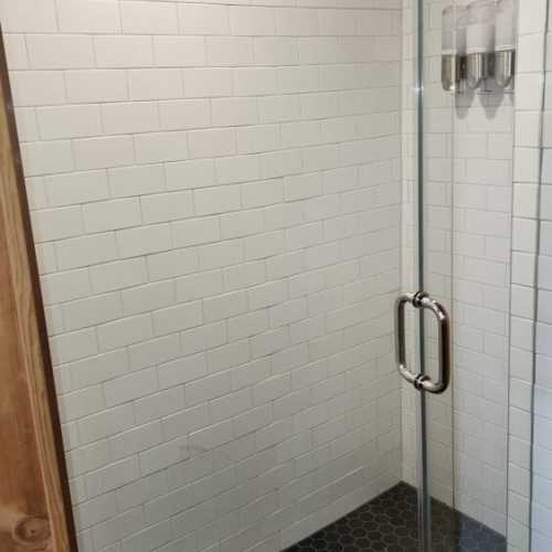 Bathroom #1: Main floor full bath with shower, shared by lower bedrooms and great room