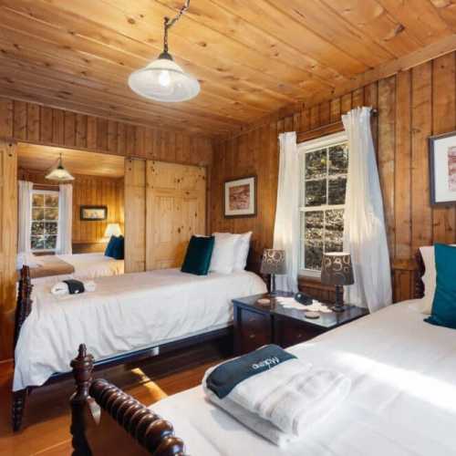 Bedroom #2: Two twin beds on the main floor; note that bedroom 1 and 2 are only separated by sliding doors