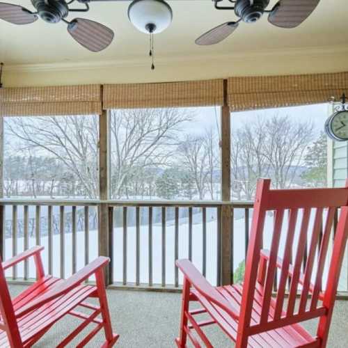Bedroom #1: queen bed on main floor with en suite full bath and private porch