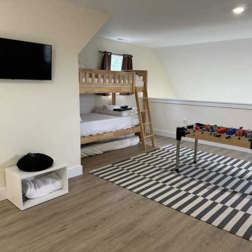 Upstairs sleeping area and game room. Note that this area is open to the living room below, so kids sleeping up here can hear people in the room below.