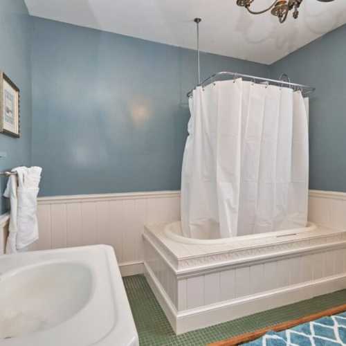 Bathroom #3: full bathroom with bathtub/shower combo, shared by bedrooms #3 and #4 on the 2nd floor