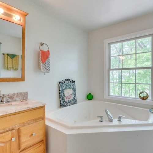 Bathroom #1: full bathroom on 2nd floor with jetted bathtub and separate shower
