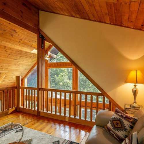 The loft sitting area, just off the loft bedroom, can a smart TV with the option to stream using your favorite streaming service (Netflix, Prime Video, etc.)