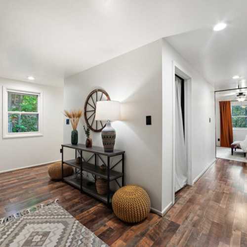 Bedroom #1: King bed is separated from bunk beds by curtains