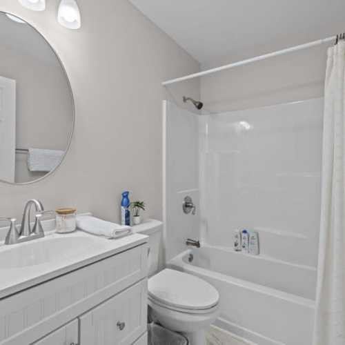 Bathroom 2: full bathroom on main floor with bathtub/shower combo