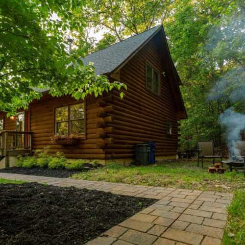 The fire pit in the back of the house means you can enjoy the great outdoors even after the sun sets and the temperature drops (firewood and hatchet not provided).