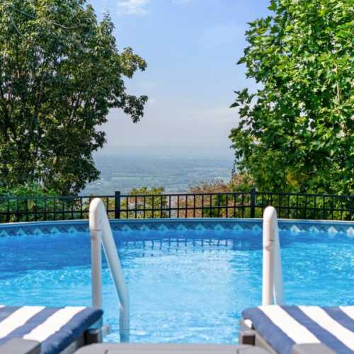 Enjoy a soak in the pool with views over the valley. You will never want to leave!