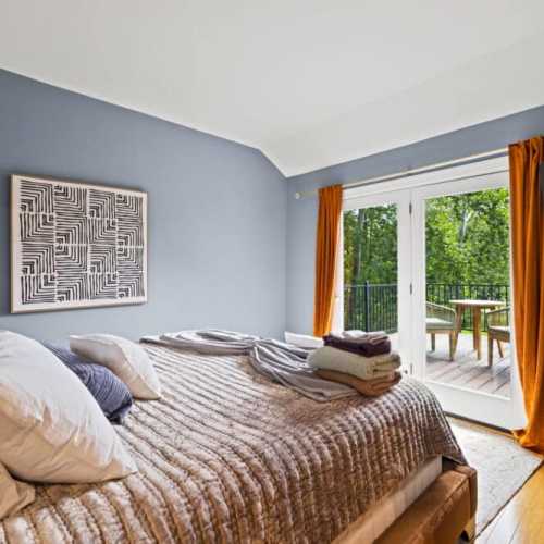 Bedroom #1: king bed on 2nd floor with a private sitting room and private balcony