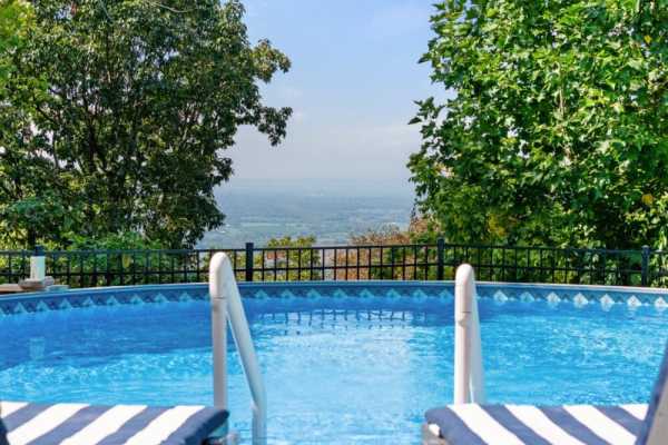 Mountaintop Cabin w/ Poolside Sunsets!