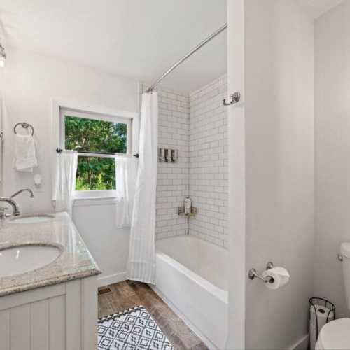 Bathroom #2: full bath on main floor with shower/bathtub combo