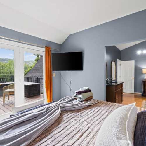 Bedroom #1: king bed on 2nd floor with a private sitting room and private balcony