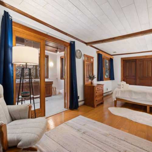 Bedroom #2: king bed and twin bed on main floor with en suite bathroom