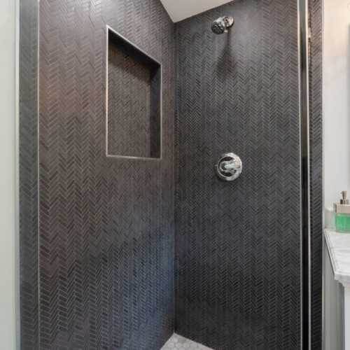 Bathroom #1: full bathroom with shower, en suite for bedroom #1
