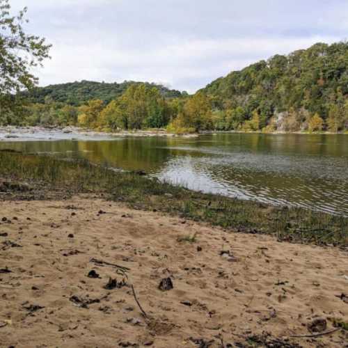 This secluded beach below the rapids is just down the hill and through the woods--a 10-15 minute walk from the house. The beach itself is state park land that borders the property.