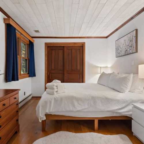 Bedroom #2: king bed and twin bed on main floor with en suite bathroom