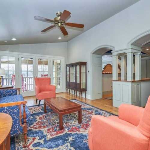 Bedroom #1: queen bed on main floor with en suite full bath and private porch