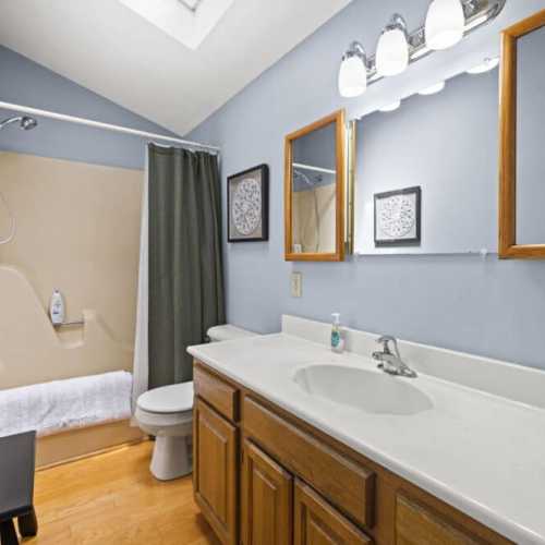 Bathroom #1: full bathroom with shower/tub combo on 2nd floor