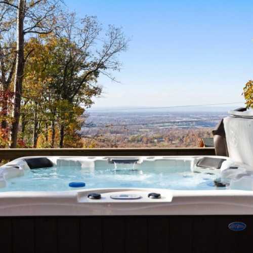 Imagine immersing yourself in a warm, bubbling hot tub, perfectly positioned to offer panoramic views of majestic mountain ranges. The crisp, fresh air enhances the soothing experience as you relax, surrounded by nature's grandeur.