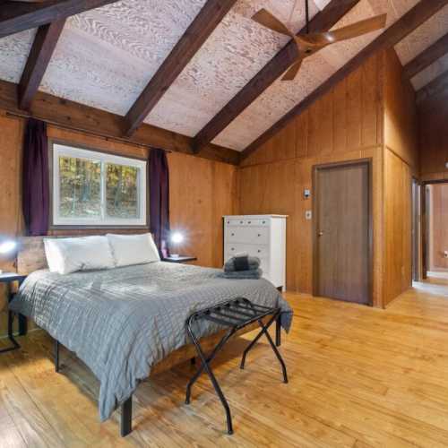 Bedroom #1: queen bed on main floor with en suite bathroom