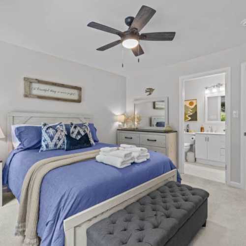 Bedroom 1: queen bed, main floor, en suite bathroom