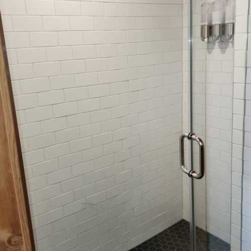Bathroom #1: Main floor full bath with shower, shared by lower bedrooms and great room